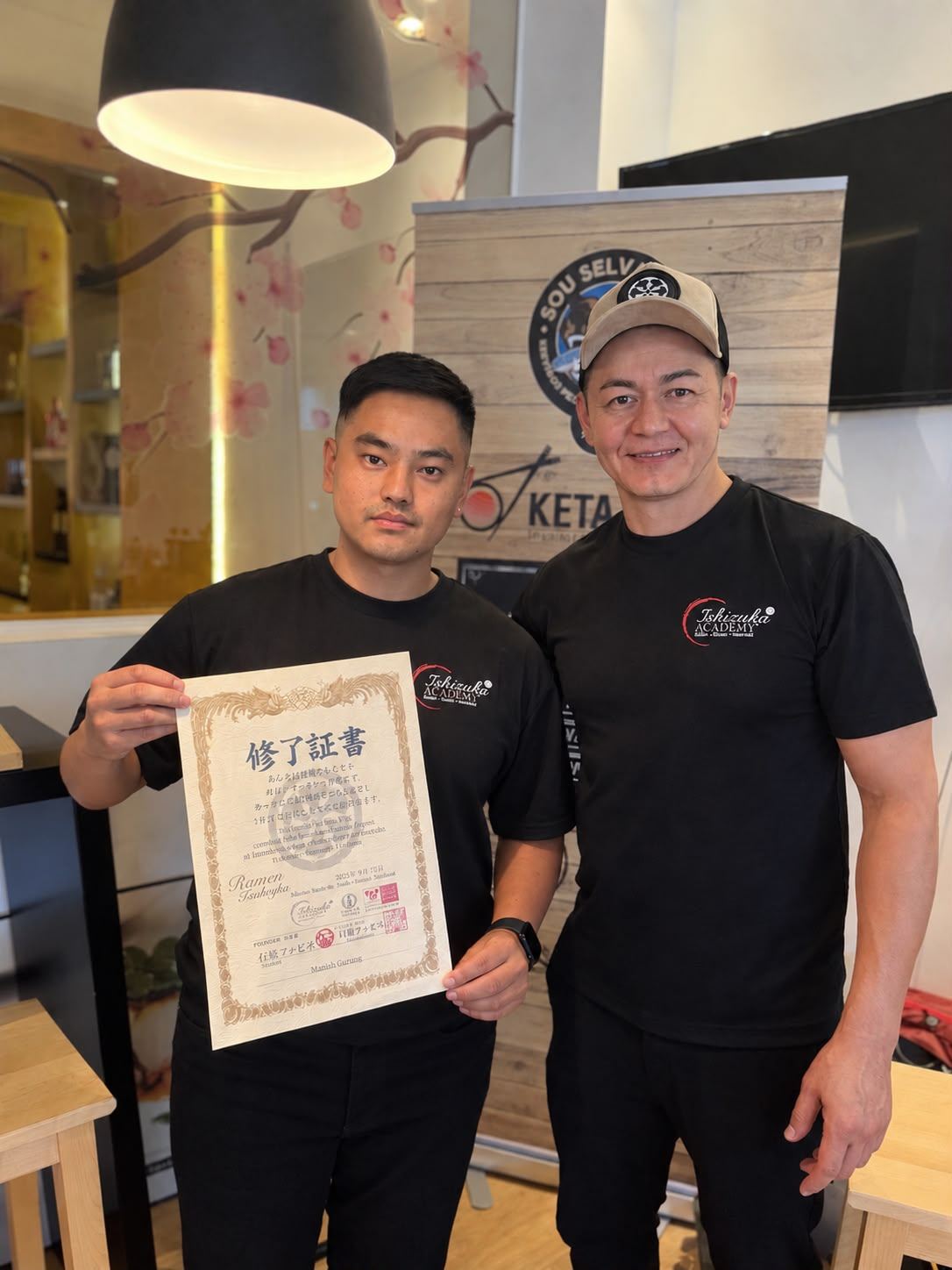 Chef Manish Gurung receiving his Ramen & Izakaya certificate from Chef Fabio Ishizuka
